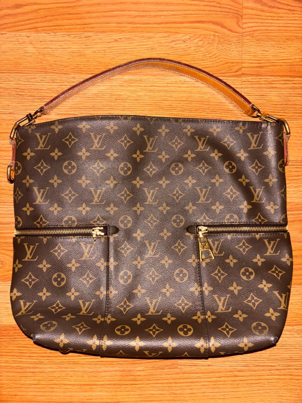 Louis Vuitton Monogram Mélie Hobo Bag.